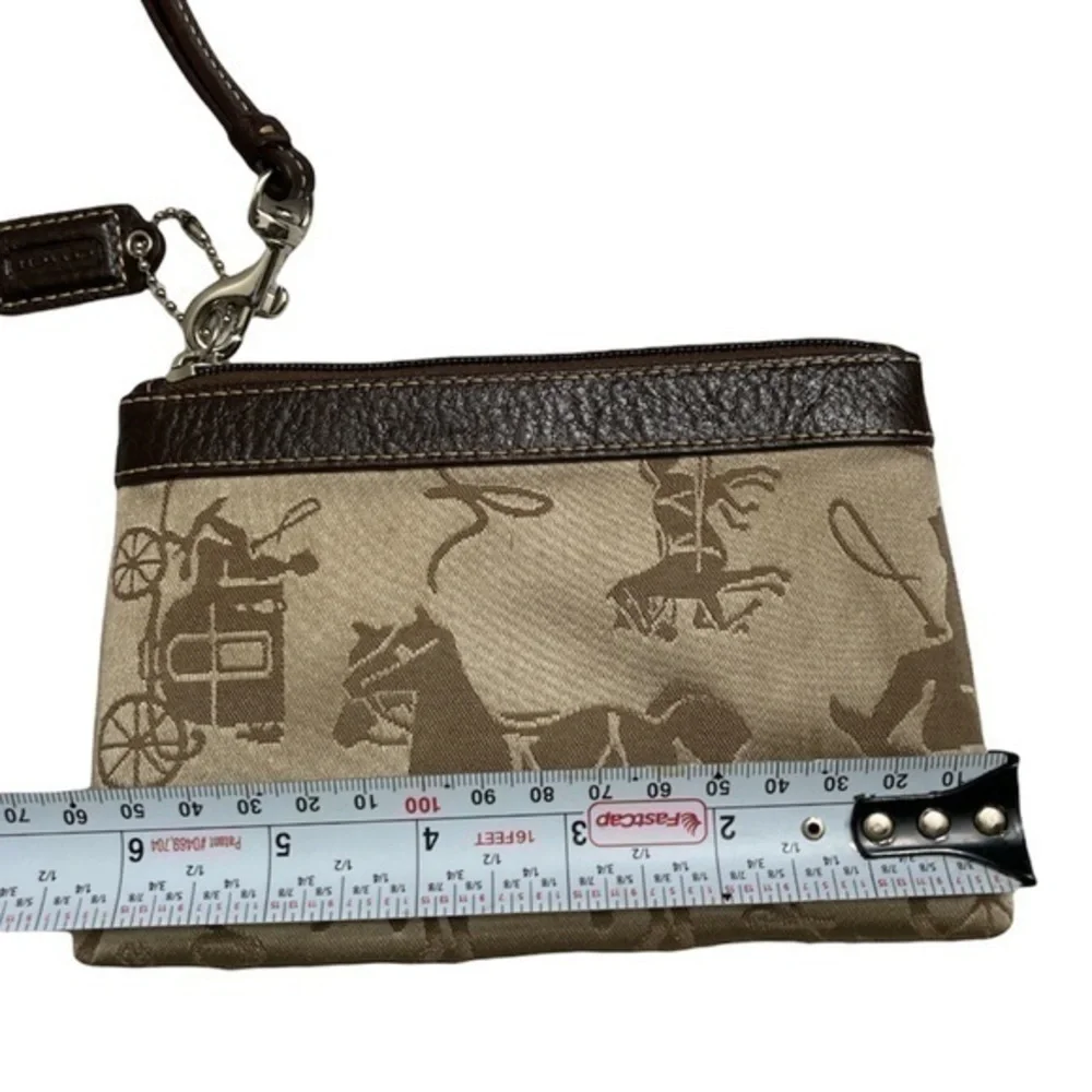 Coach carriage brown wristlet bag
